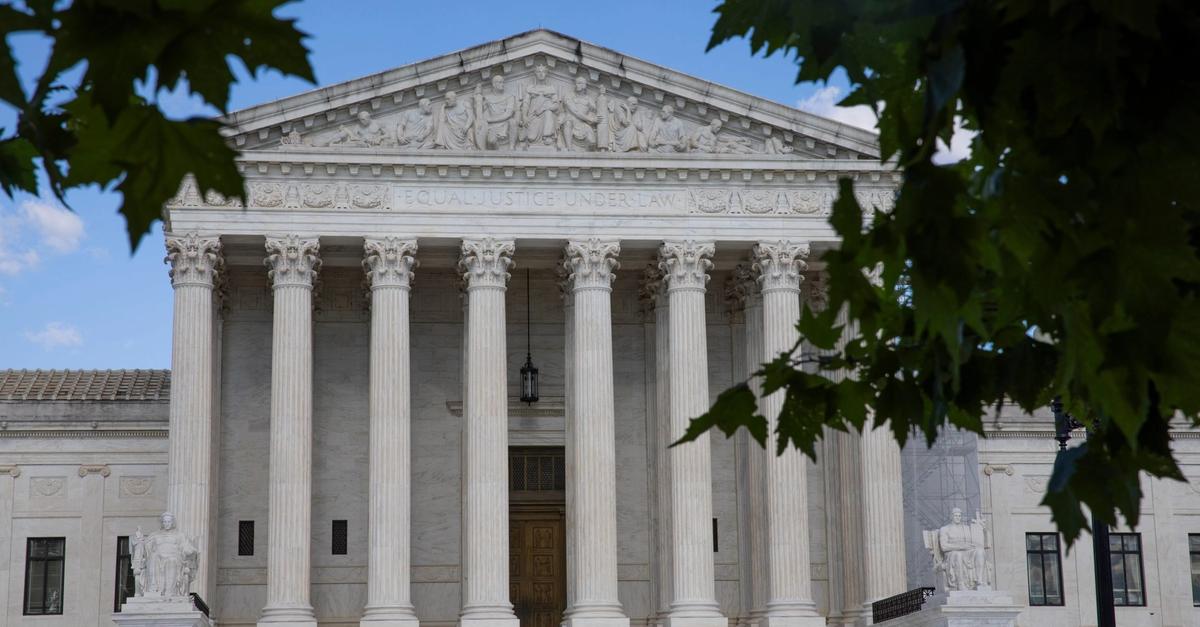 A stylized image of the Supreme Court building with subtle digital circuit board overlays.