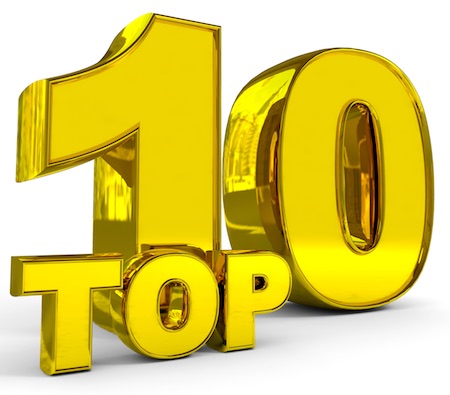 A gavel resting on a stack of legal documents with patent filings scattered around it.