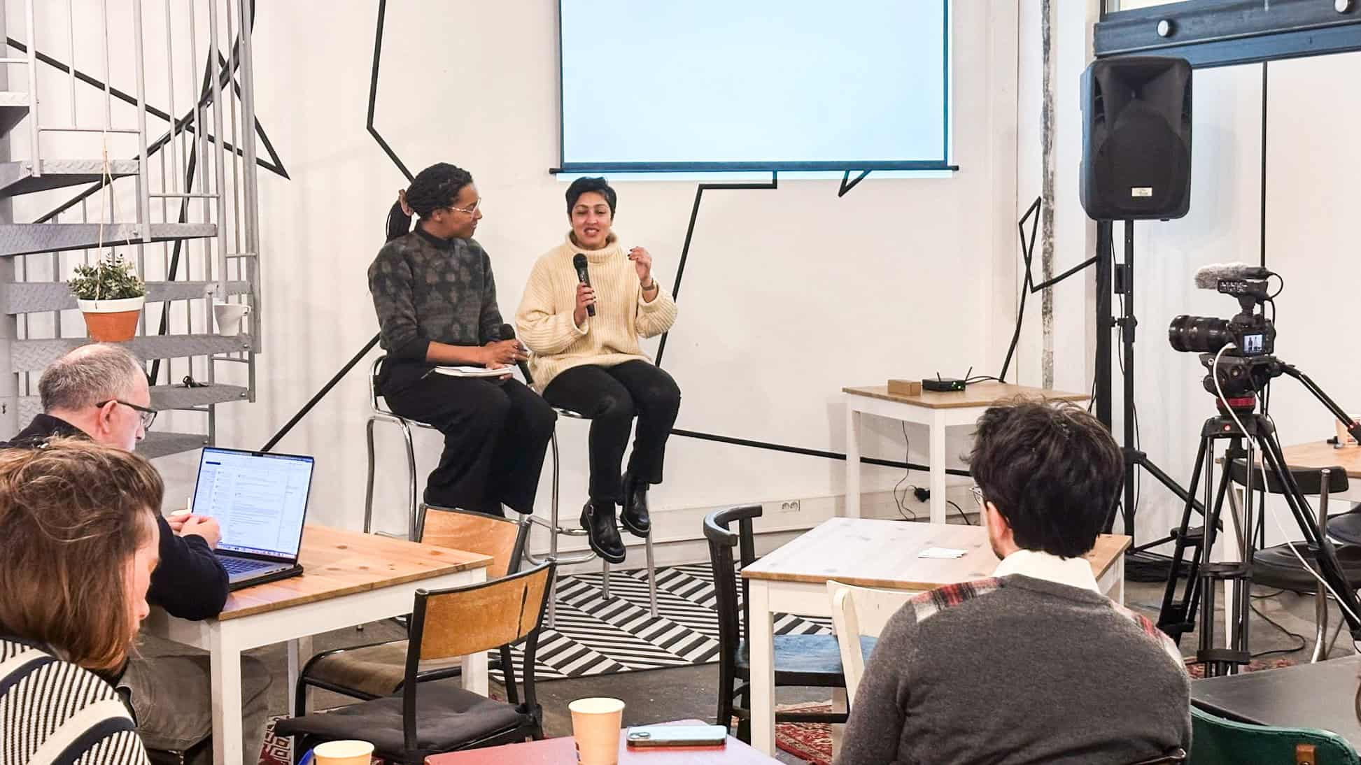 Rumman Chowdhury at Paris AI Safety Breakfast podium discussing audits