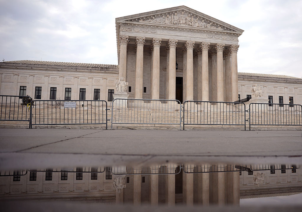 U.S. Supreme Court facade at dusk with steps leading to columns