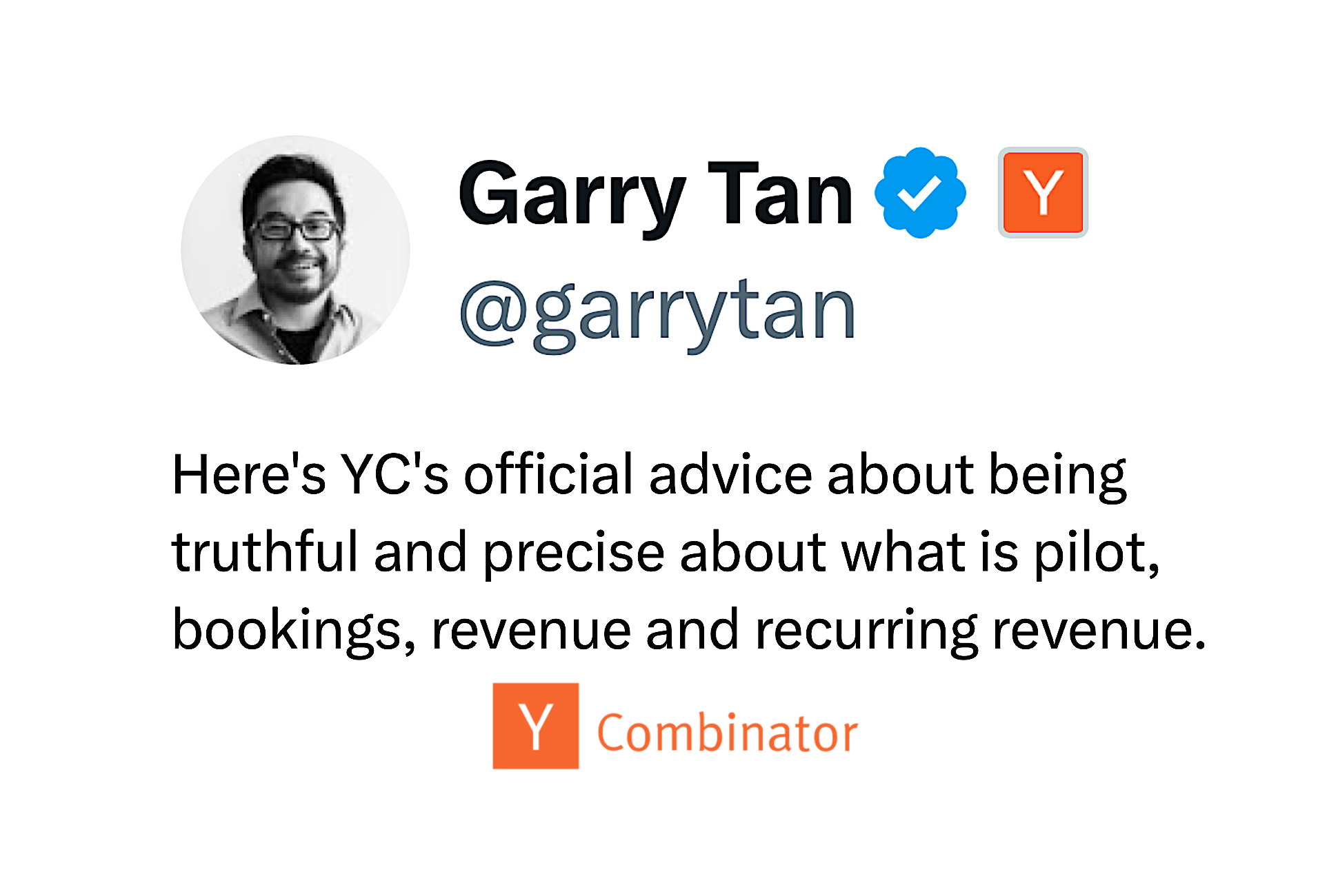Garry Tan, CEO of Y Combinator, speaking at a conference with a backdrop of the YC logo.